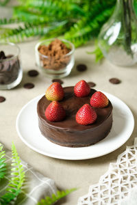 Close-up of strawberries in plate on table