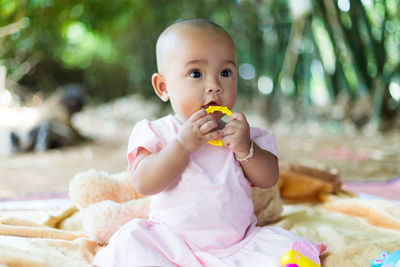 Portrait of cute boy eating food