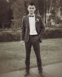 Portrait of young man standing outdoors