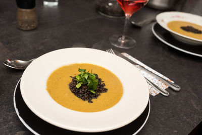 High angle view of soup served on table