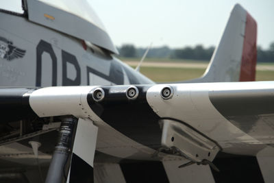 Close-up of airplane against sky