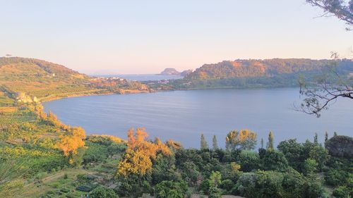 Scenic view of lake against sky during autumn