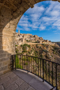 Buildings seen through arch at sassi di matera