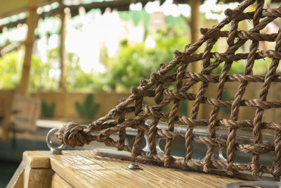 Close-up of rope on wooden table