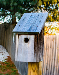 Close-up of wooden post