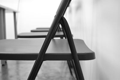 Close-up of empty chair at home