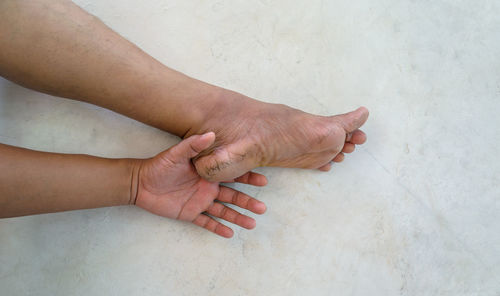 High angle view of people holding hands