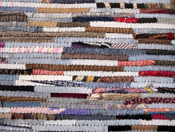 Full frame shot of multi colored umbrellas on rug