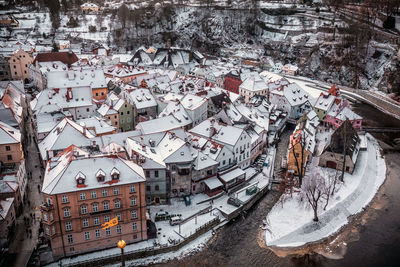 High angle view of houses in town during winter