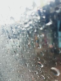 Full frame shot of wet glass window