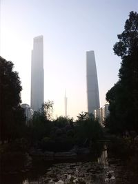 Low angle view of tall building against clear sky