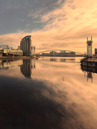 Sunrise view of a bridge over the river. salford quays england 