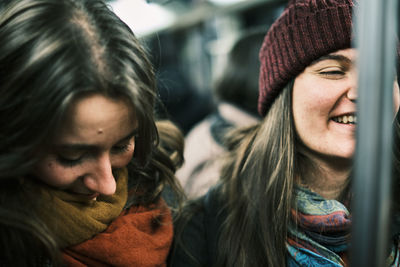 Portrait of smiling young woman in winter