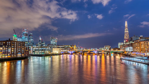 The city of london and the river thames at night