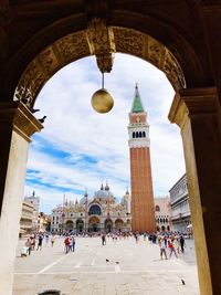 Group of people in front of historic building