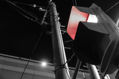 Low angle view of illuminated lamp