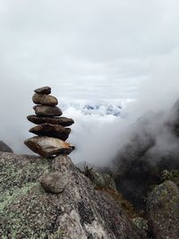 Stack of rocks against sky