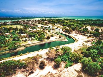 Aerial view of landscape and sea against sky