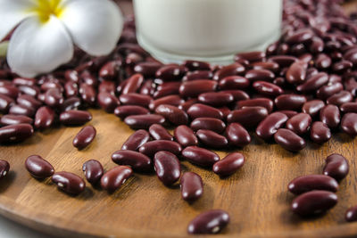 Close-up of roasted coffee beans on table