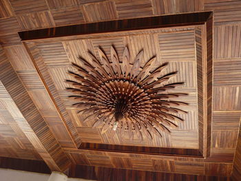 Low angle view of illuminated ceiling