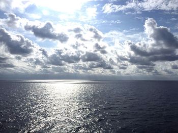 Scenic view of sea against cloudy sky