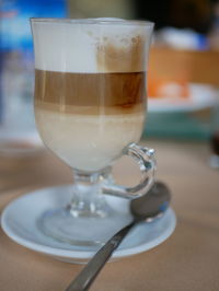 Close-up of coffee in glass on table
