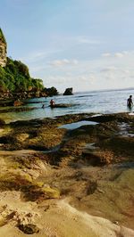 Scenic view of beach against sky