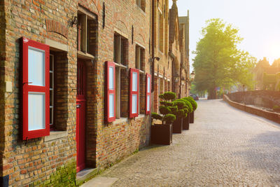 Alley amidst buildings in city