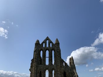 Low angle view of historic building against sky