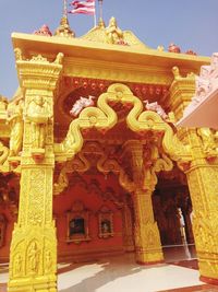 Low angle view of temple against building