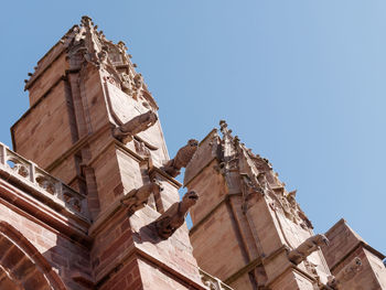 Low angle view of old building against clear sky