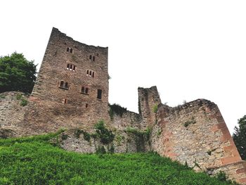 Low angle view of historic building against clear sky