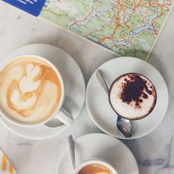 High angle view of cappuccino on table