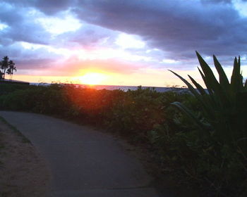 Scenic view of landscape against cloudy sky