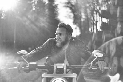 Mature man riding motorcycle