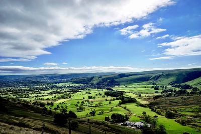 Aerial view of agricultural landscape against sky