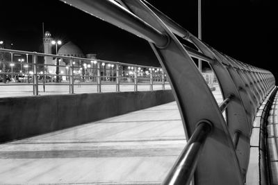 Illuminated bridge at night