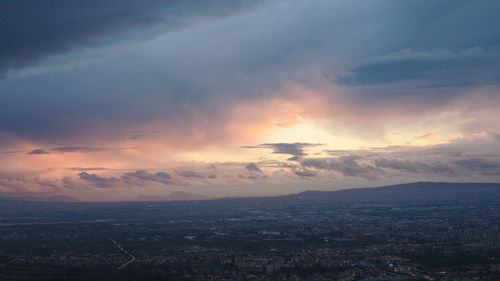 High angle shot of cityscape at sunset