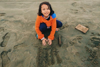 High angle portrait of girl on beach