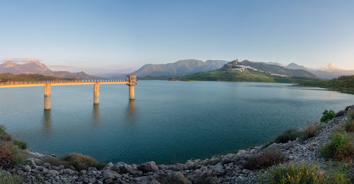 Scenic view of lake against sky during sunset