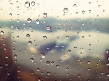 Close-up of water drops on glass