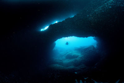 View of people swimming in sea