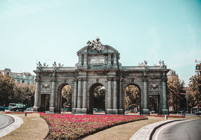 Statue in front of building