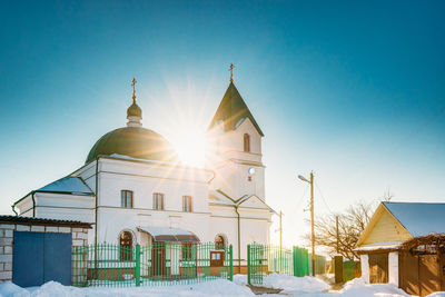 Church against clear sky during winter