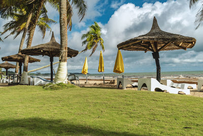 Built structure on beach against sky