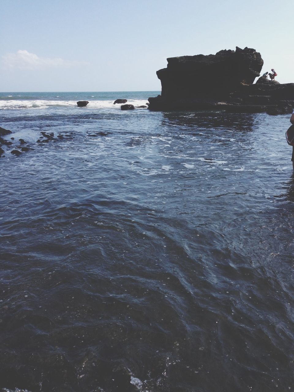 sea, water, horizon over water, tranquil scene, scenics, tranquility, beauty in nature, waterfront, clear sky, nature, rippled, sky, wave, beach, idyllic, rock - object, blue, shore, seascape, day