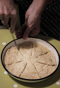 Close-up of person preparing food