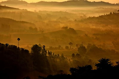 Scenic view of landscape against sky during sunset
