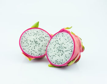 Close-up of fruits against white background