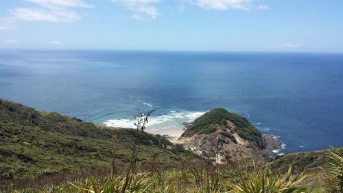 Scenic view of sea against blue sky